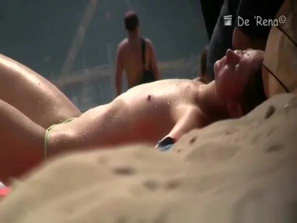 Small boobs teen 18+ topless at beach