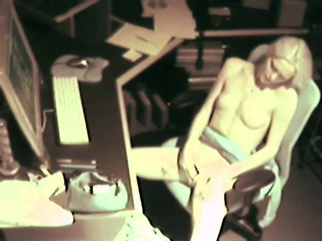 Hidden camera captures a pale blonde hottie fiddling with herself