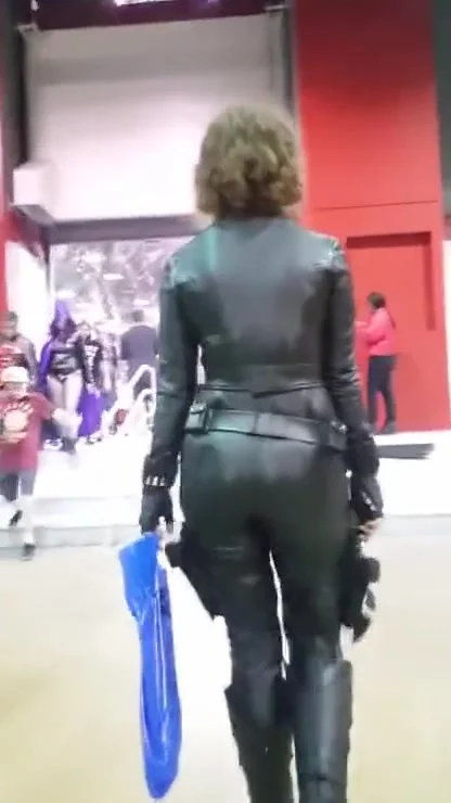 Candid teen 18+ ass follow caught by black widow in sexy leather