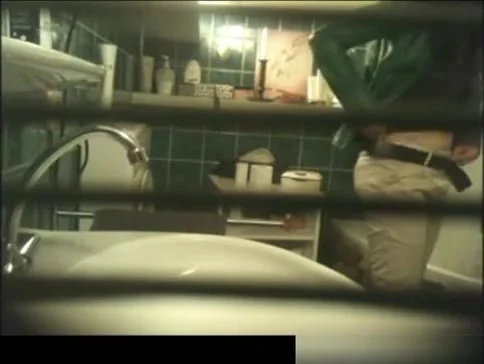 behind the bathroom window