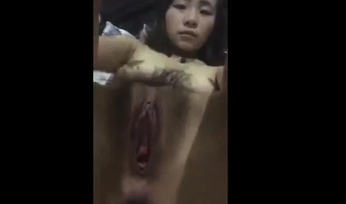 Chinese girl rubbing pussy