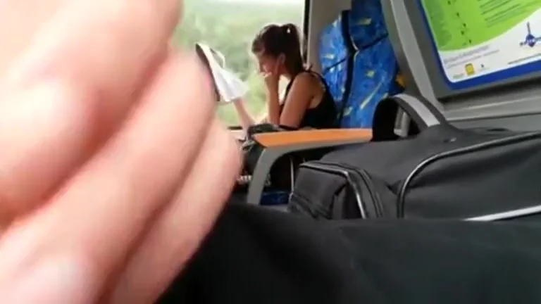 Slowly stroking his dick on the public bus
