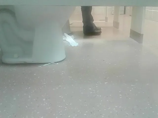 Woman has diarrhea in public restroom