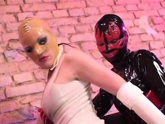 Nastya and Alia P introduce their slave to latex and how to fuck in it
