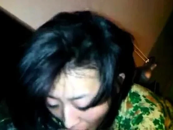Naughty Vietnamese slut sucks a dark cock