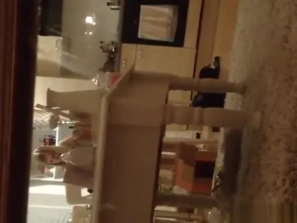 Woman spied in her kitchen
