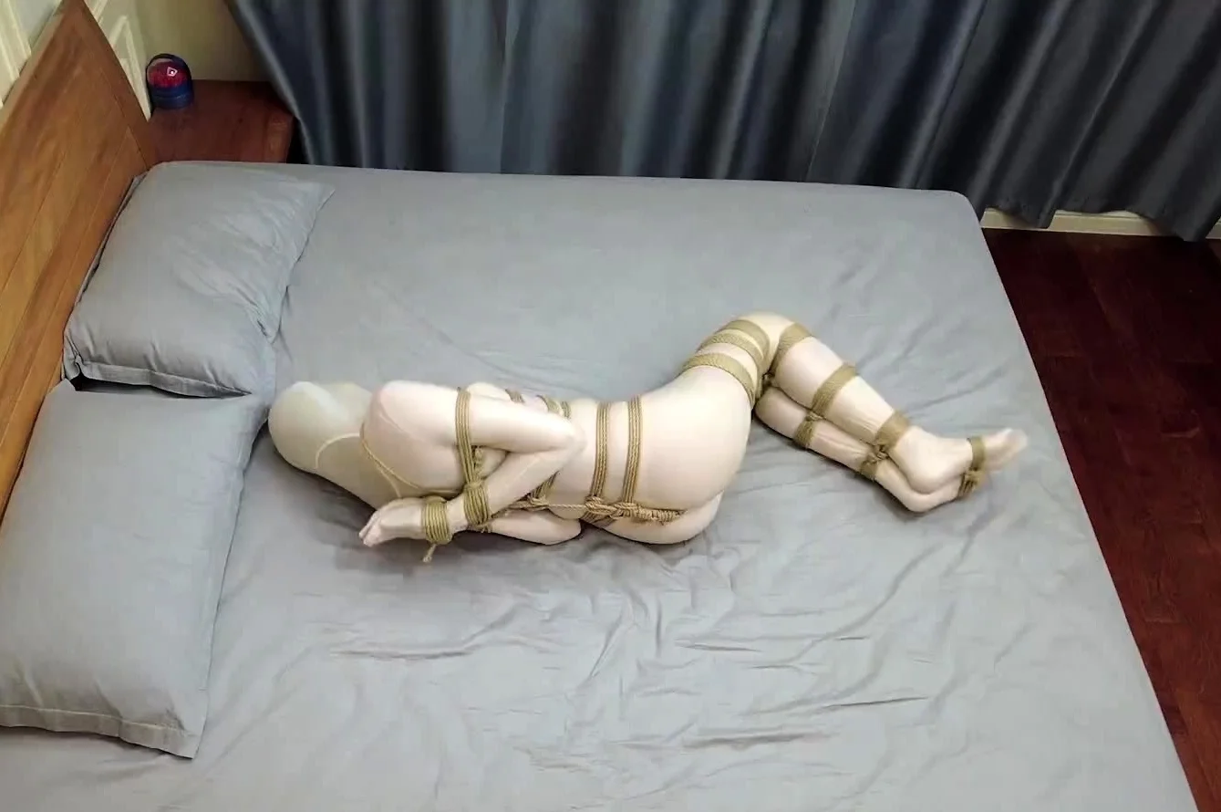Cocooned Girl In Rope Bondage