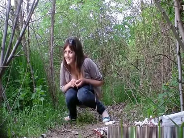 Big tits girl in tight jeans peeing outdoors