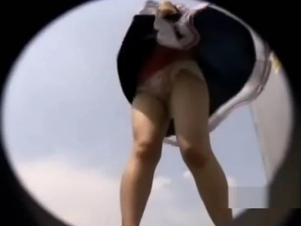 Asian teen 18+ can't do anything to hide her thong when the wind blows dress up
