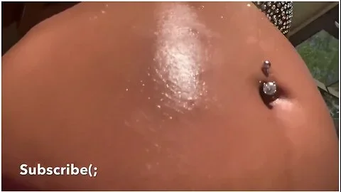 Pregnant Chick Oiling Herself Down By The Pool!