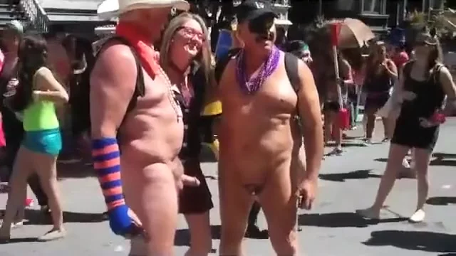 Two old exhibitionists take pictures with hot chicks while being naked
