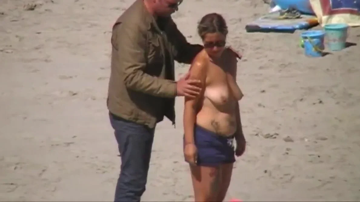 German milf on french beach spy. Shaky quality.