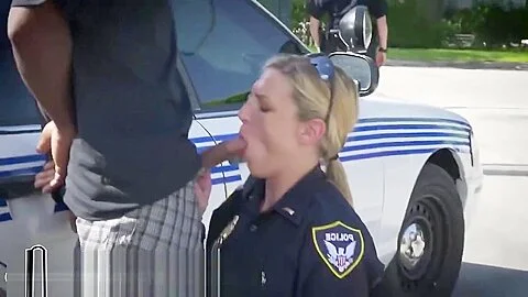 Two busty cops apprehend a big black cock