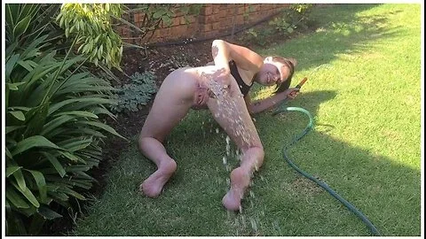 Inserting A Hosepipe In My Ass And Cunt And Squirting The Water Out