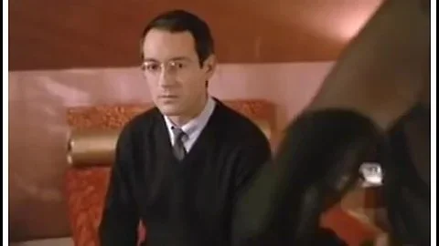 German femdom babe dominates a man in a suit