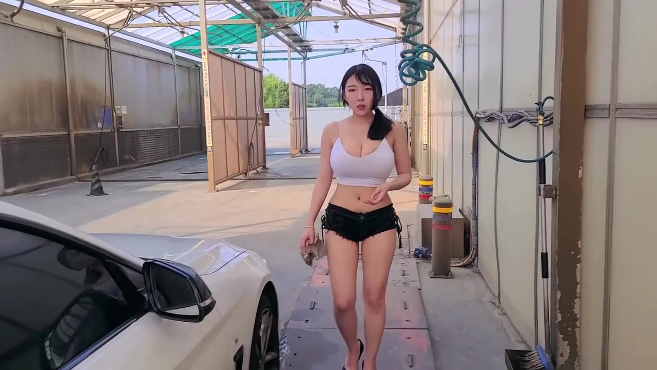 Sexy Korean Woman Washing Her Car