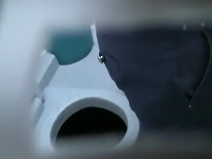 Closeup spying of a pissing lady