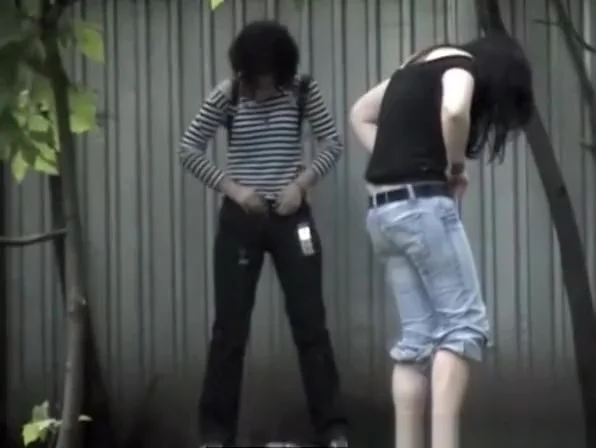 Two teen 18+ caught by peeing