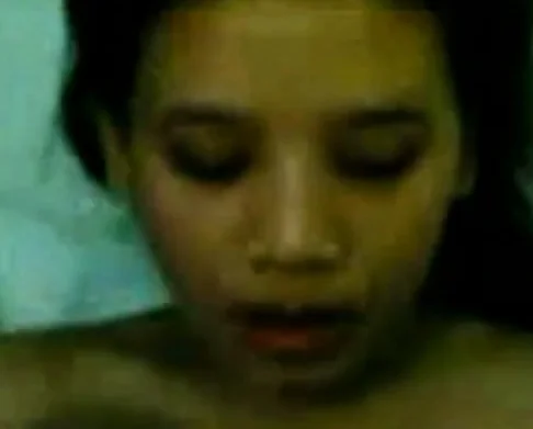Malaysian girl in a close-up amateur video.