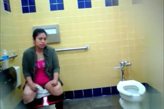 Curvy Step mommy urinates in the public WC