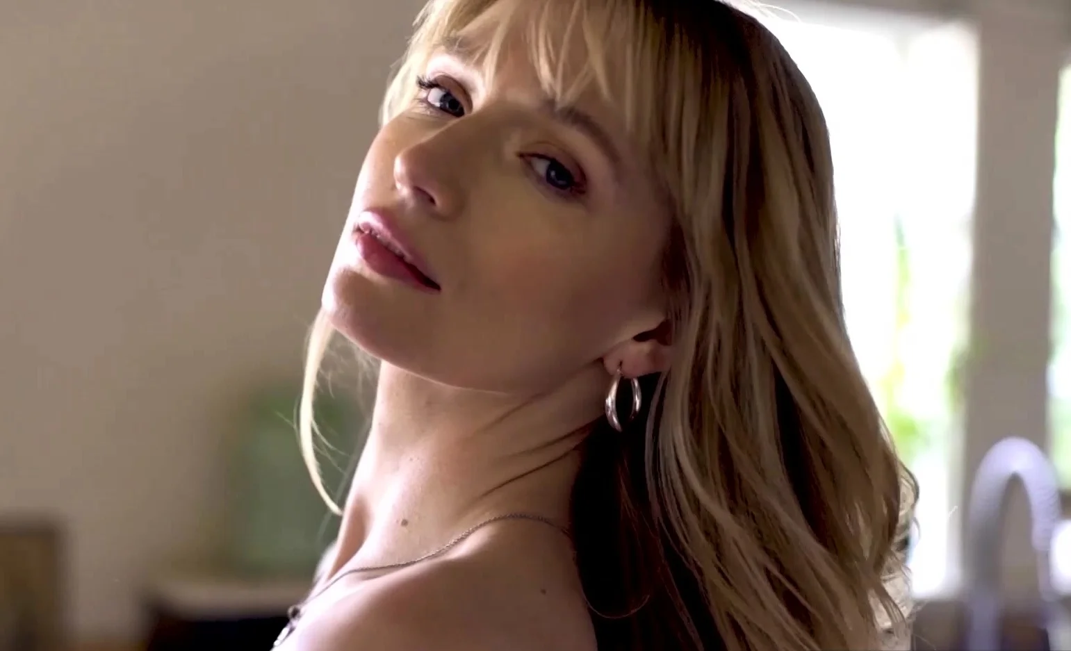 Petite blonde beauty reveals juicy boobs