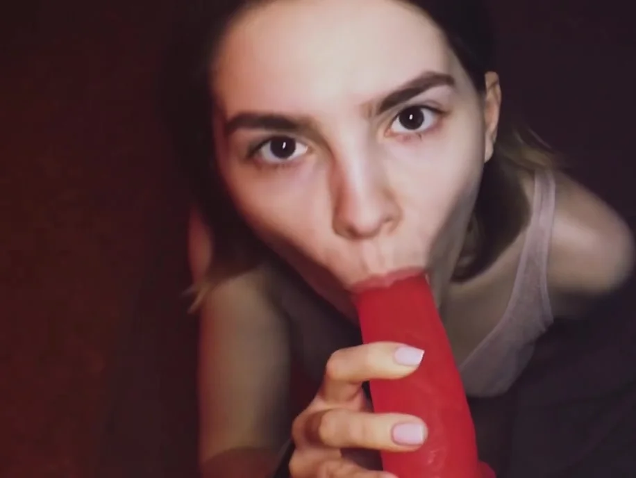 CUTE SLUT SWEETS SUCKING PINK DILDO