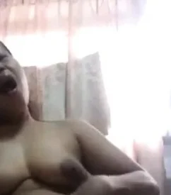 Asian MIlf showing off rubbing her pussy