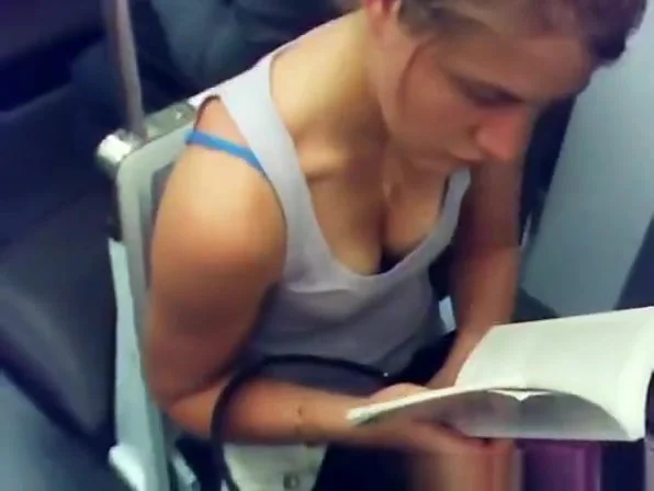 Blonde chick reading book down blouse