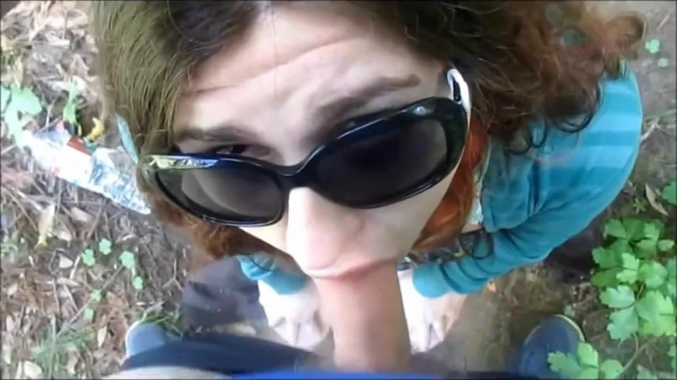 Brunette gal sucking cock