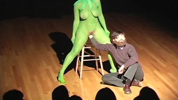 Performance - nude artist as Kermit hand puppet