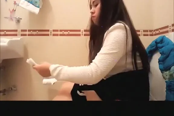 Long hair teen 18+ spied in bathroom pissing