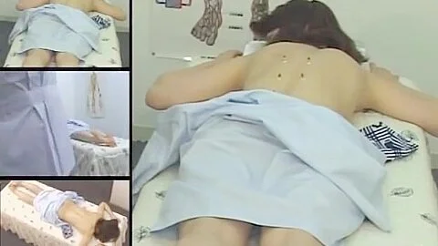 Cute Jap MILF fingered in voyeur massage room video