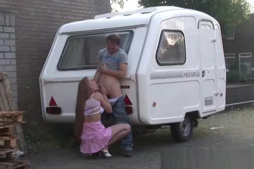 Blonde girl blows cock of tourist outside her house for money