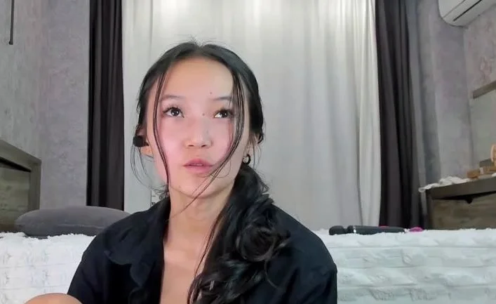 Asian babe sucking and jerking two hard dicks