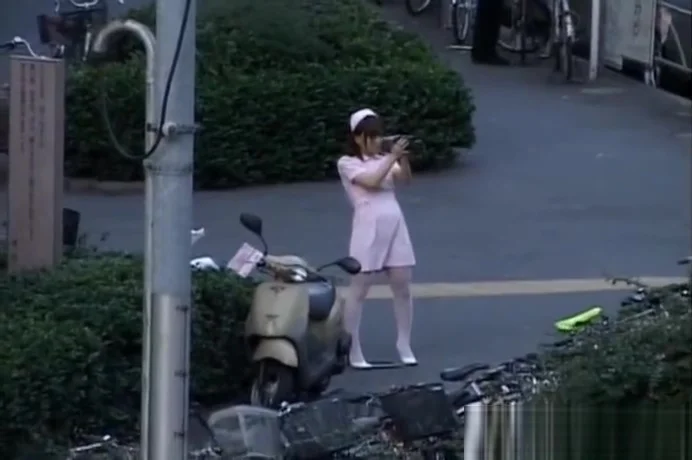 Naughty Asian girl is pissing in public part2