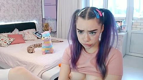 Cute girl sucking dildo and masturbating