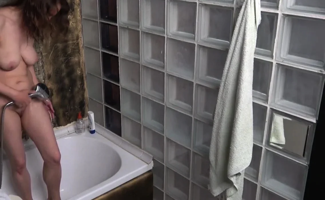 spying on my busty stepmom  in the shower