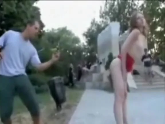 Hot nude model in a public park