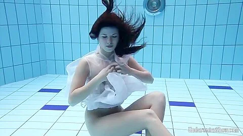 Sexy Babe Aneta Swims And Strips Naked