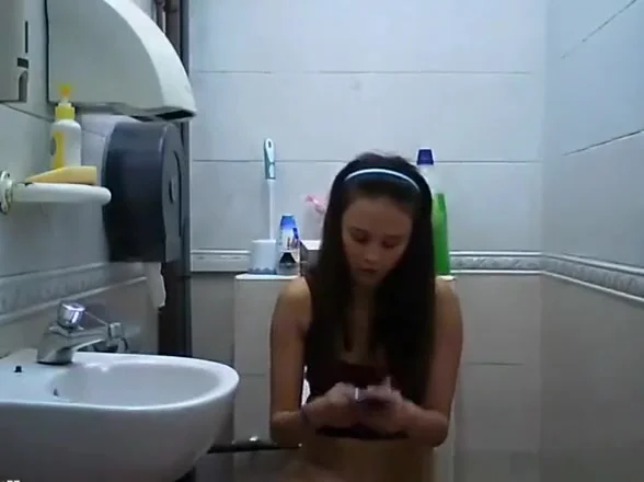 teen 18+ spied in bathroom pissing