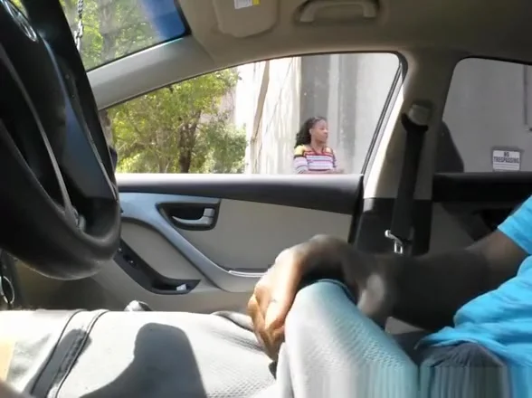 Dude flashes his black cock inside car