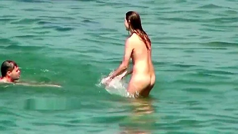 Cute teen nudists on the beach