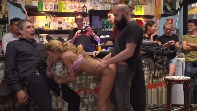 Skinny blonde gangbanged in public