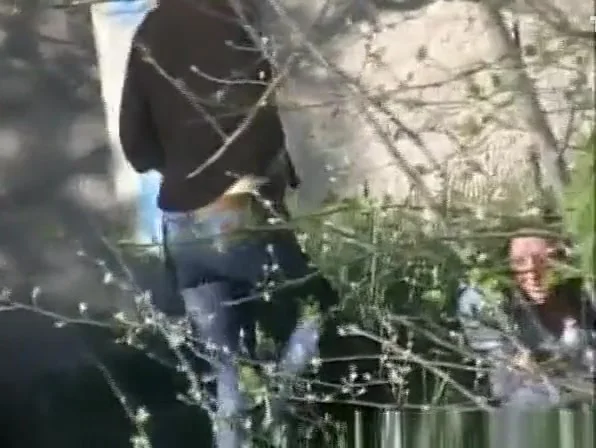 Two women caught pissing outdoors