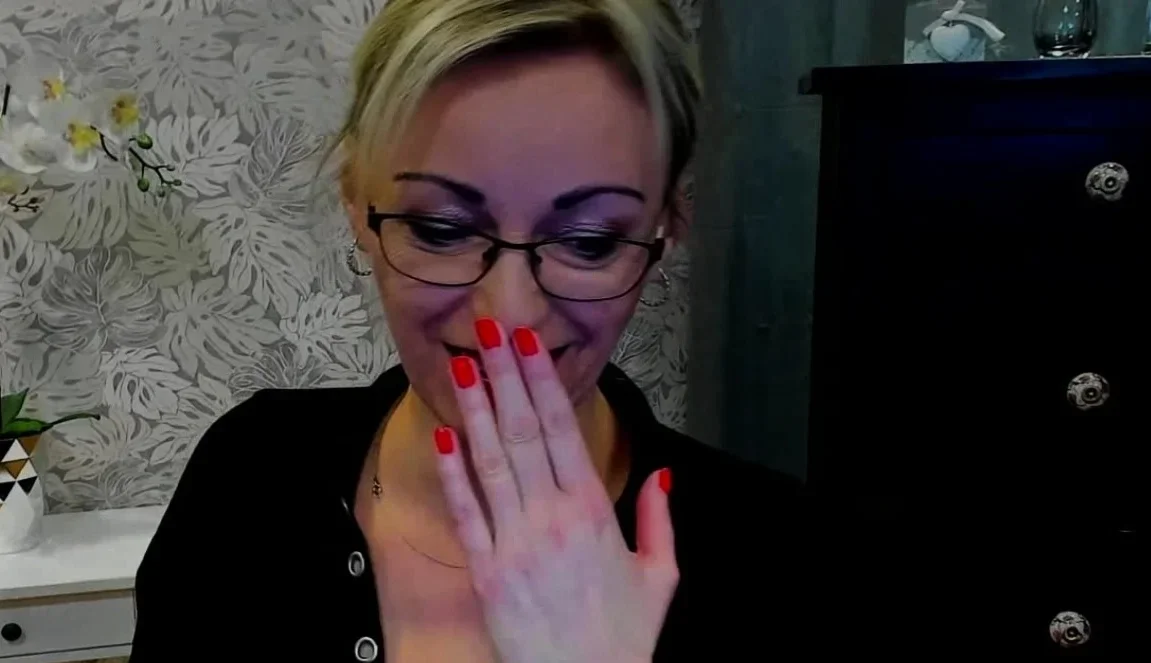German MILF posing in mini skirt on webcam
