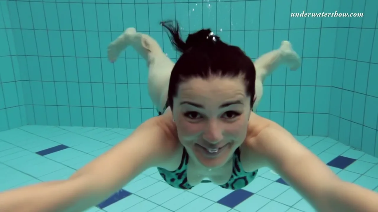 Russian Girl Swims Nude While Stripping In The Pool