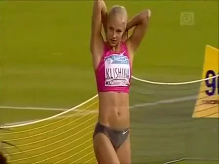 Gorgeous Russian athlete doing her long jumping