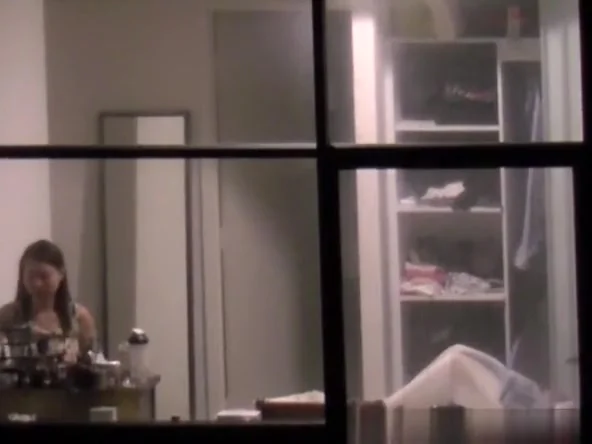 Girl spied through hotel bedroom window