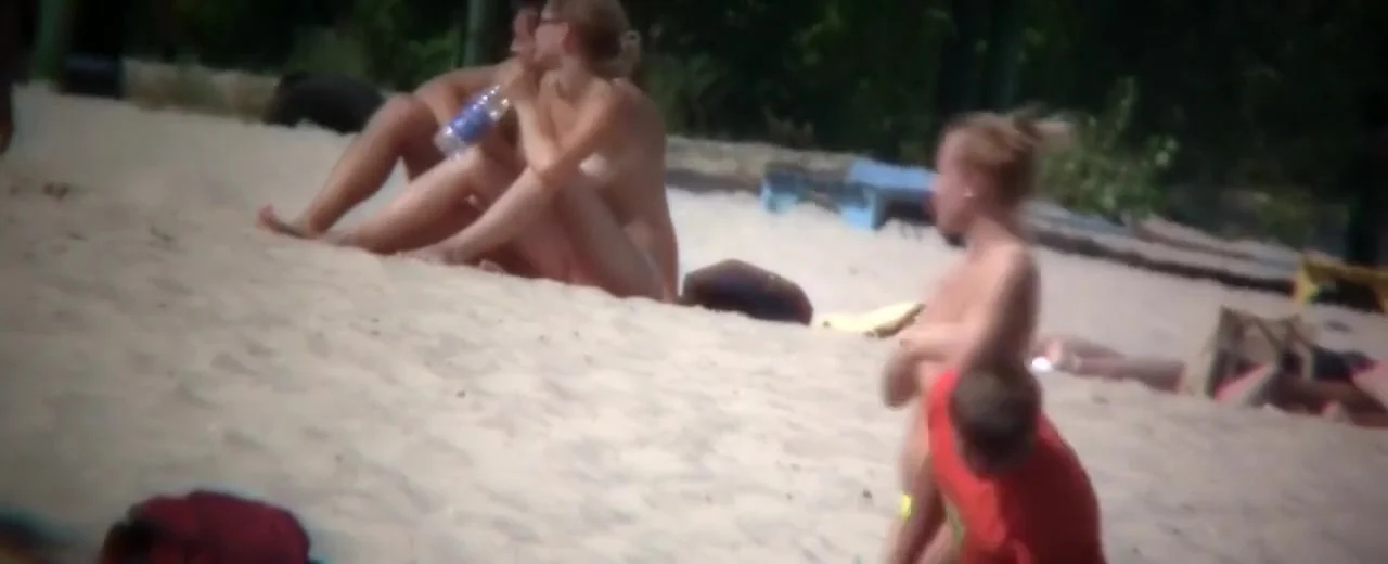 Hot young bombshells take off their bikinis to sunbathe in